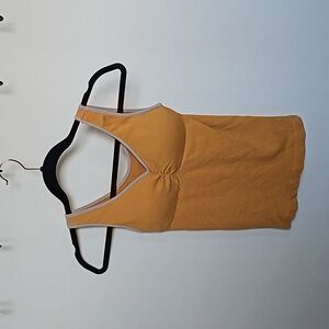 Gray and yellow tank with built in pads